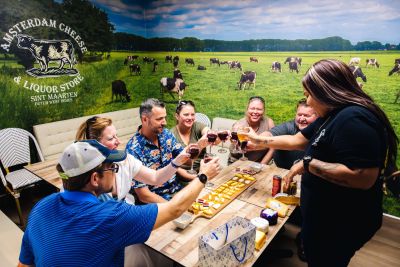 People in the cheeseCheering with Dutch cheese