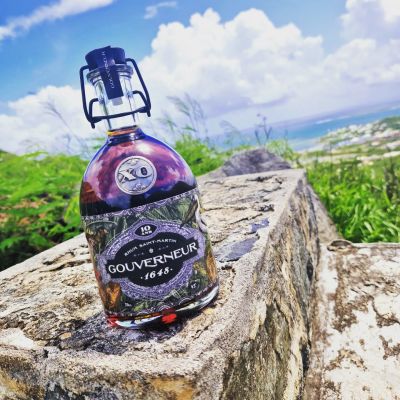 Rum bottle on a St Martin wall