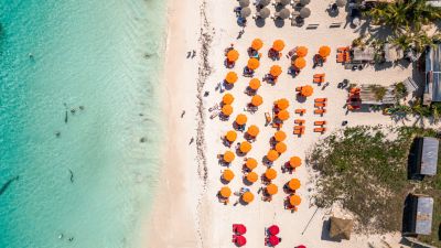 Orange umbrellas at Orient Bay