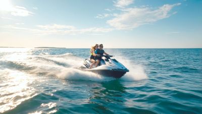 young-man-young-woman-are-riding-jet-ski-sunny-day-sea