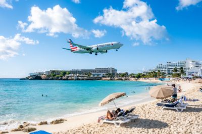 Maho Beach with a landing plane